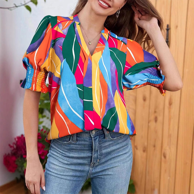 💃 חולצת נשים עם צווארון V ושרוולים תפוחים – רומנטית, פרחונית, מבד רך