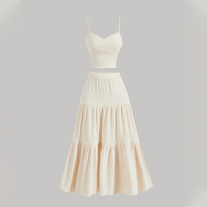 👗 סט הכולל חצאית A-line בגזרה גבוהה וחולצת גופיה – בסגנון בוהו-שיק, מבד מקומט ובגזרה מתכווננת